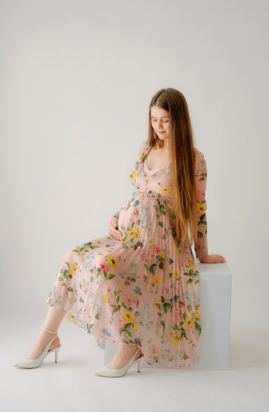 Servizio fotografico gravidanza all'aperto Roma — luce naturale, dolce attesa premaman