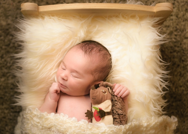 Servizio fotografico neonato Roma — newborn addormentato in studio